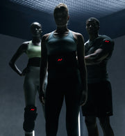 Three athletes in athletic wear wearing a venom 2 back, a venom 2 leg, and a venom 2 shoulder